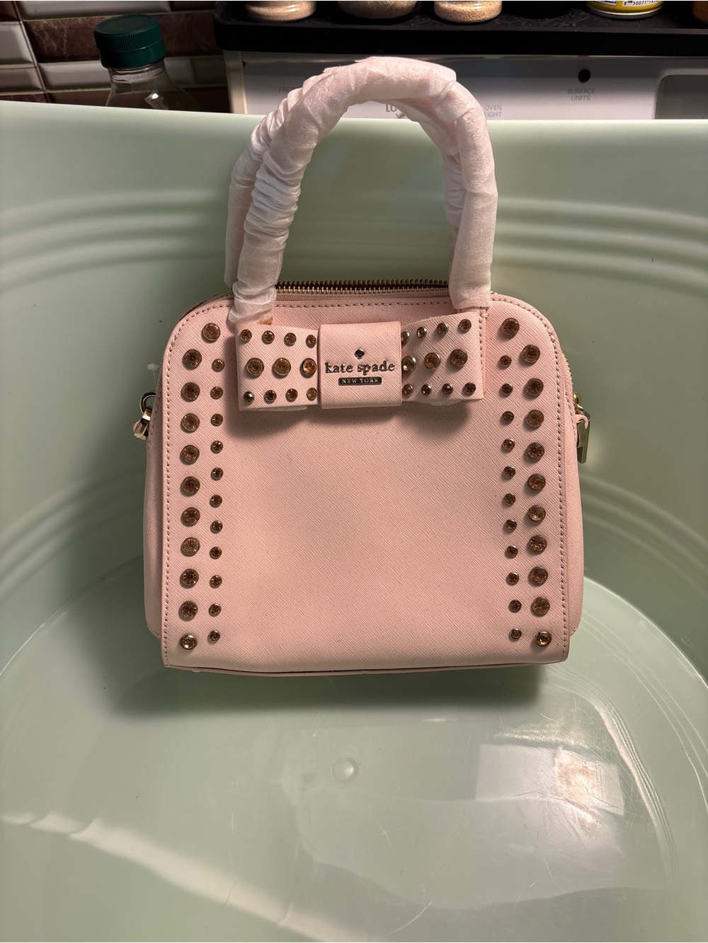 kate spade blush pink studded bow satchel